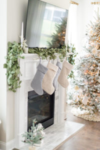 Muted Christmas stockings | Lifestyle Blogger Elle Bowes shares holiday home decor ideas.