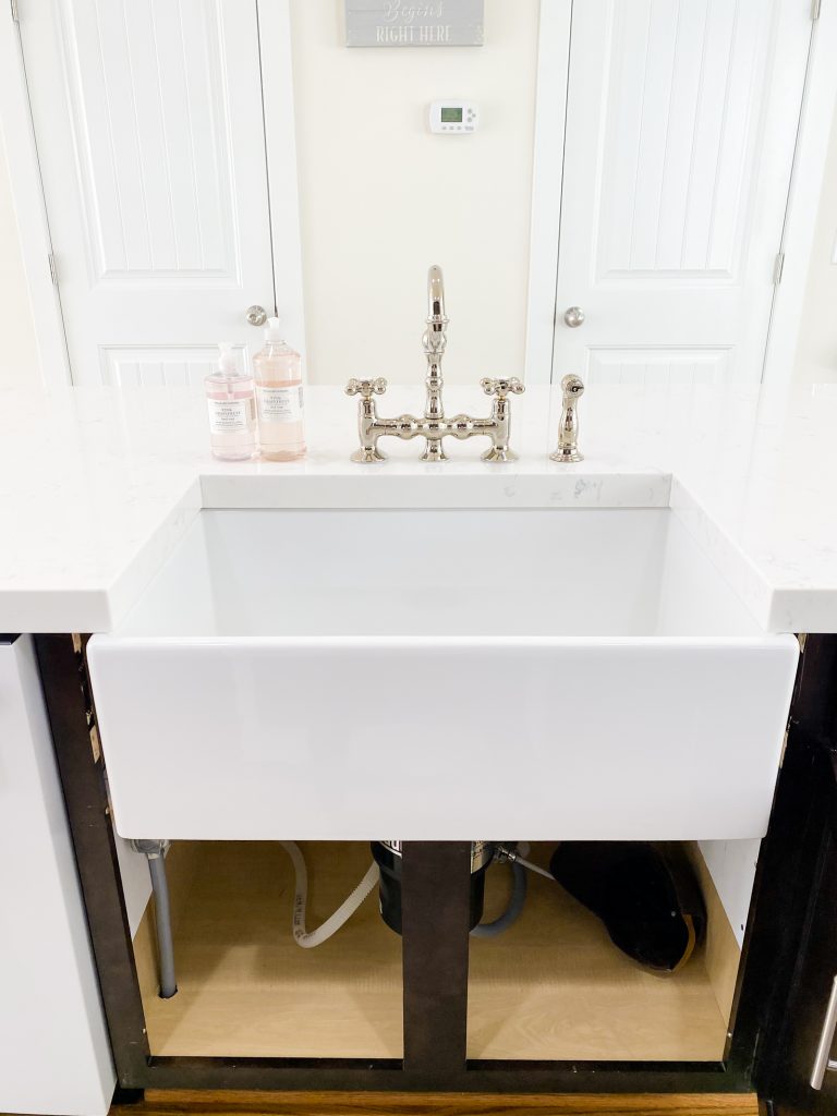 farm sink with bridge faucet